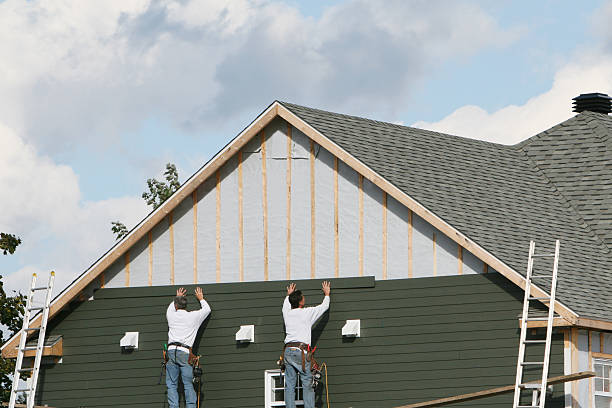 Professional Siding Contractor technician working in Crownsville, MD